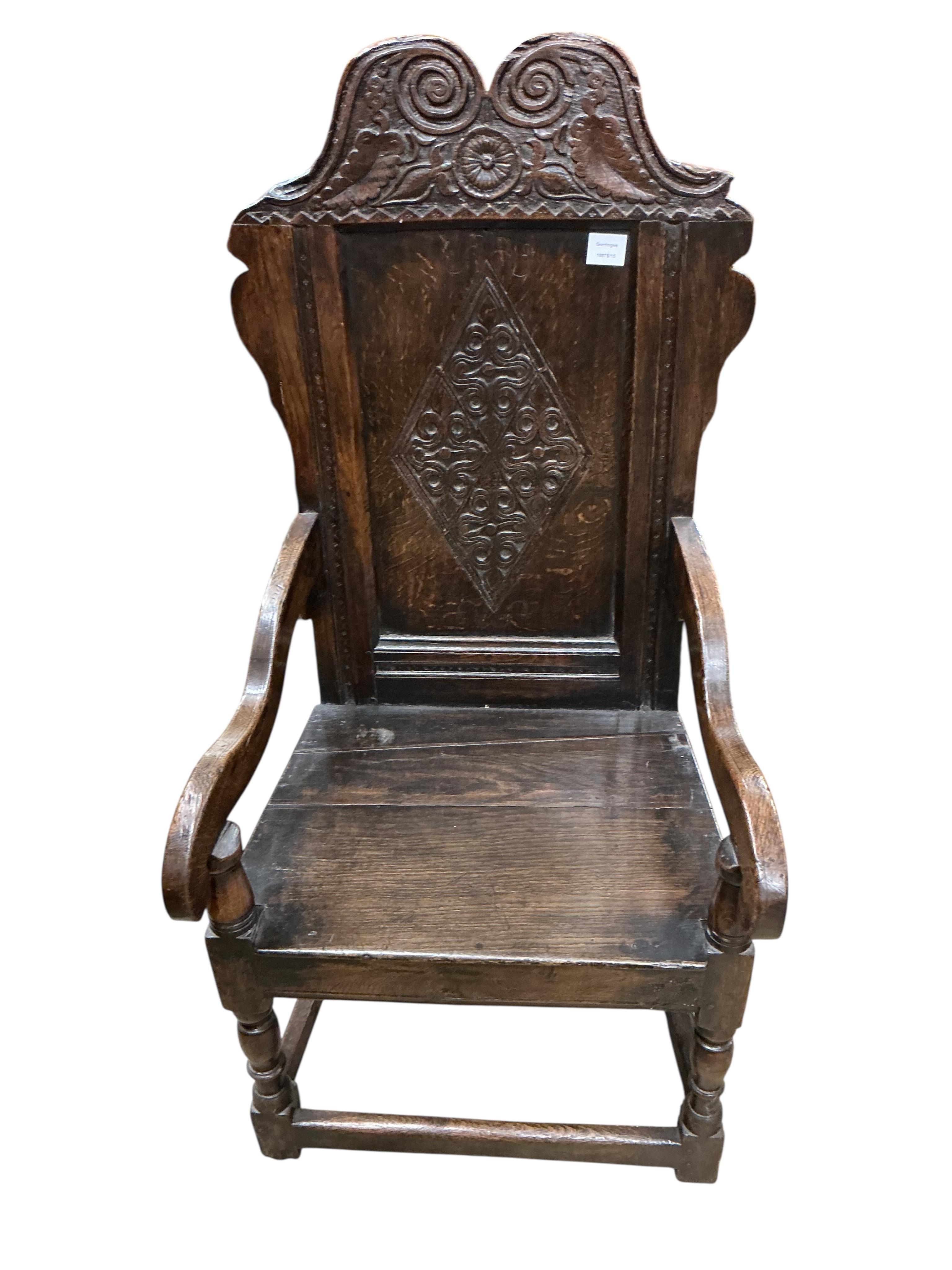 A mid 17th century oak wainscot armchair, width 58cm, depth 50cm, height 126cm